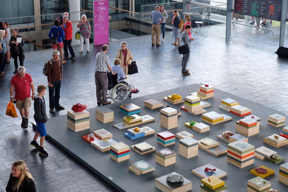 An arial-view of a colourful installation made out of boxes