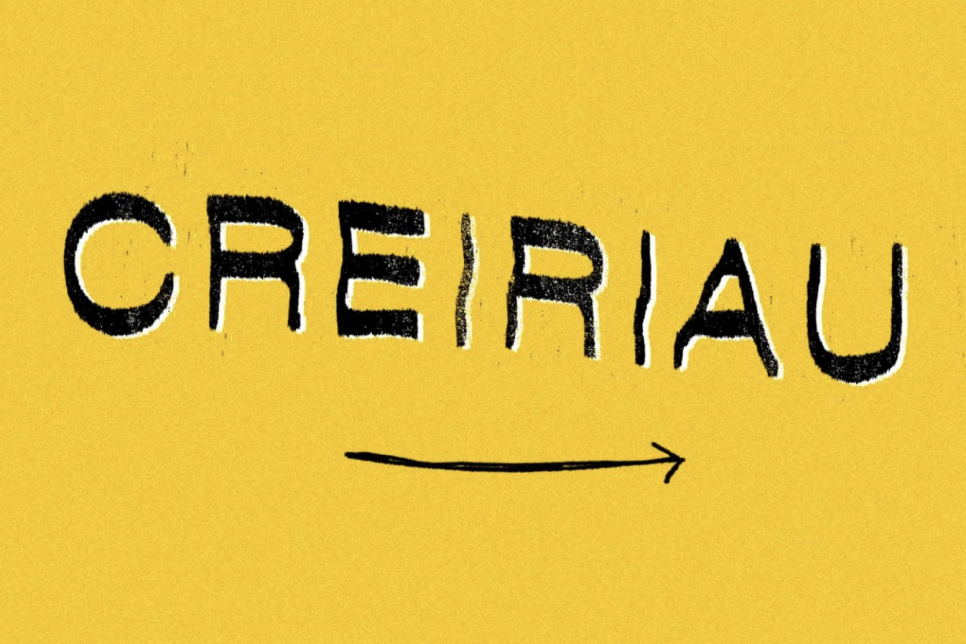 The text 'CREIRIAU' in black lettering on a yellow background