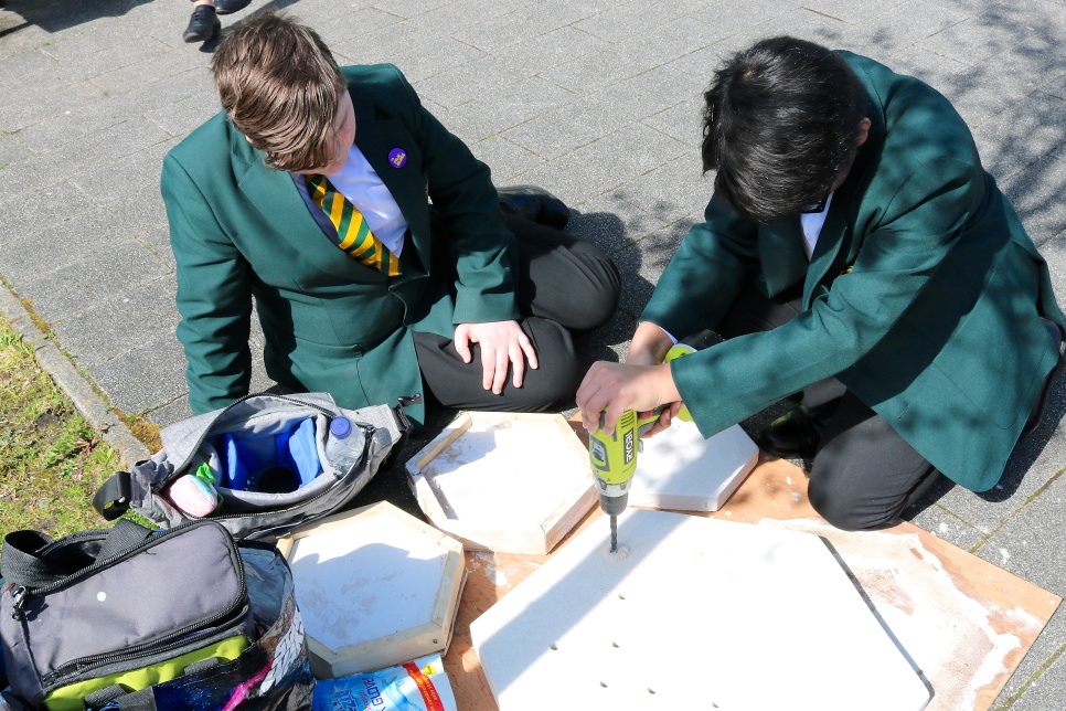 Pupils working outdoors on a Creative Learning project